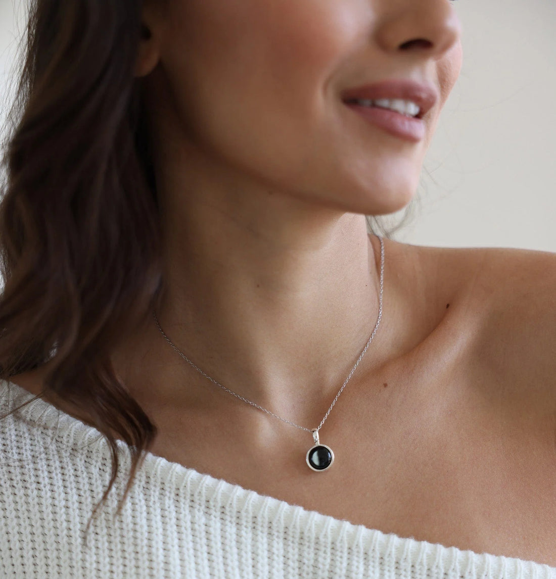 "Embrace the mystique of the moon with this radiant pendant."